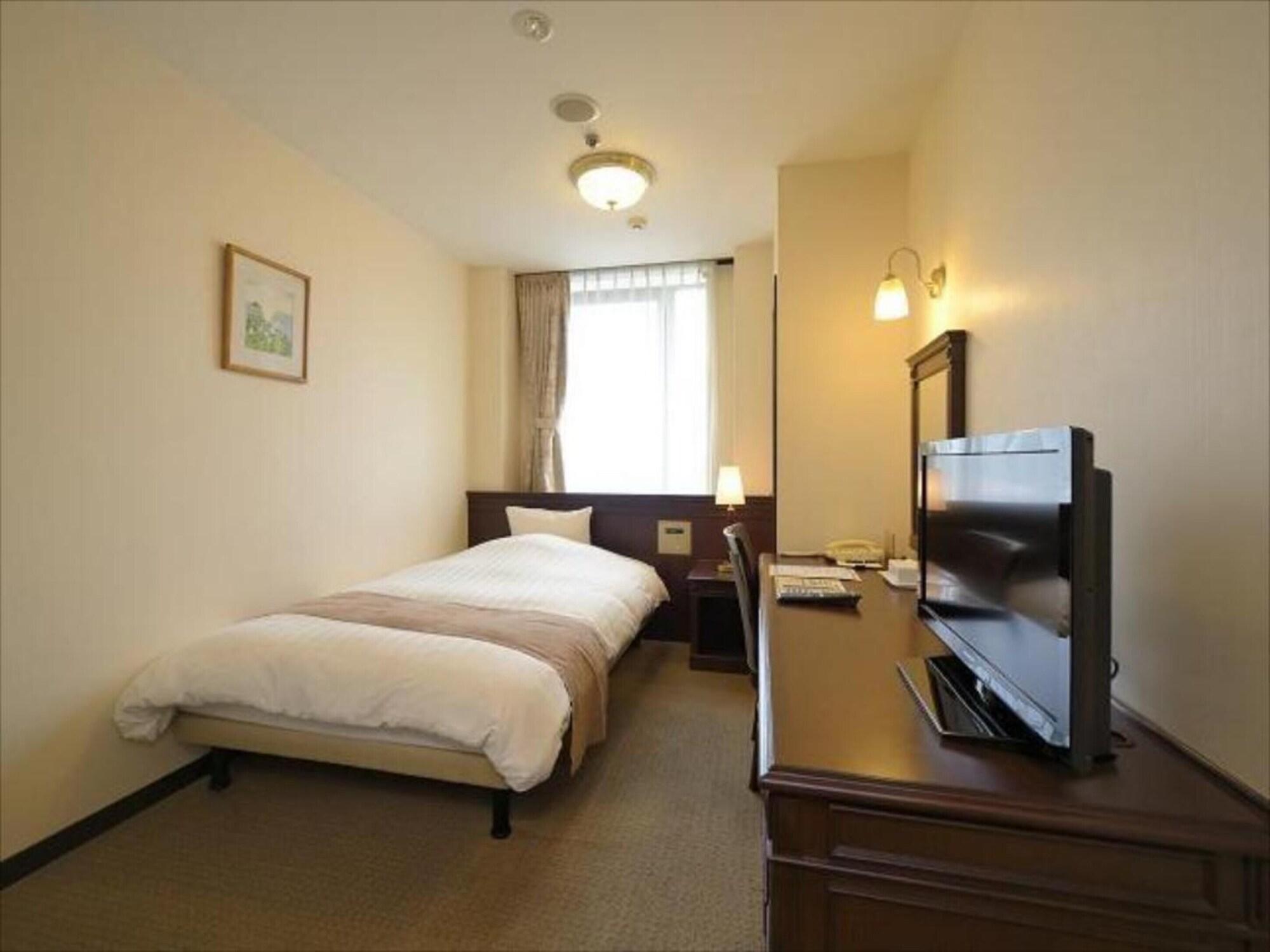 Amami Sunplaza Hotel Екстериор снимка