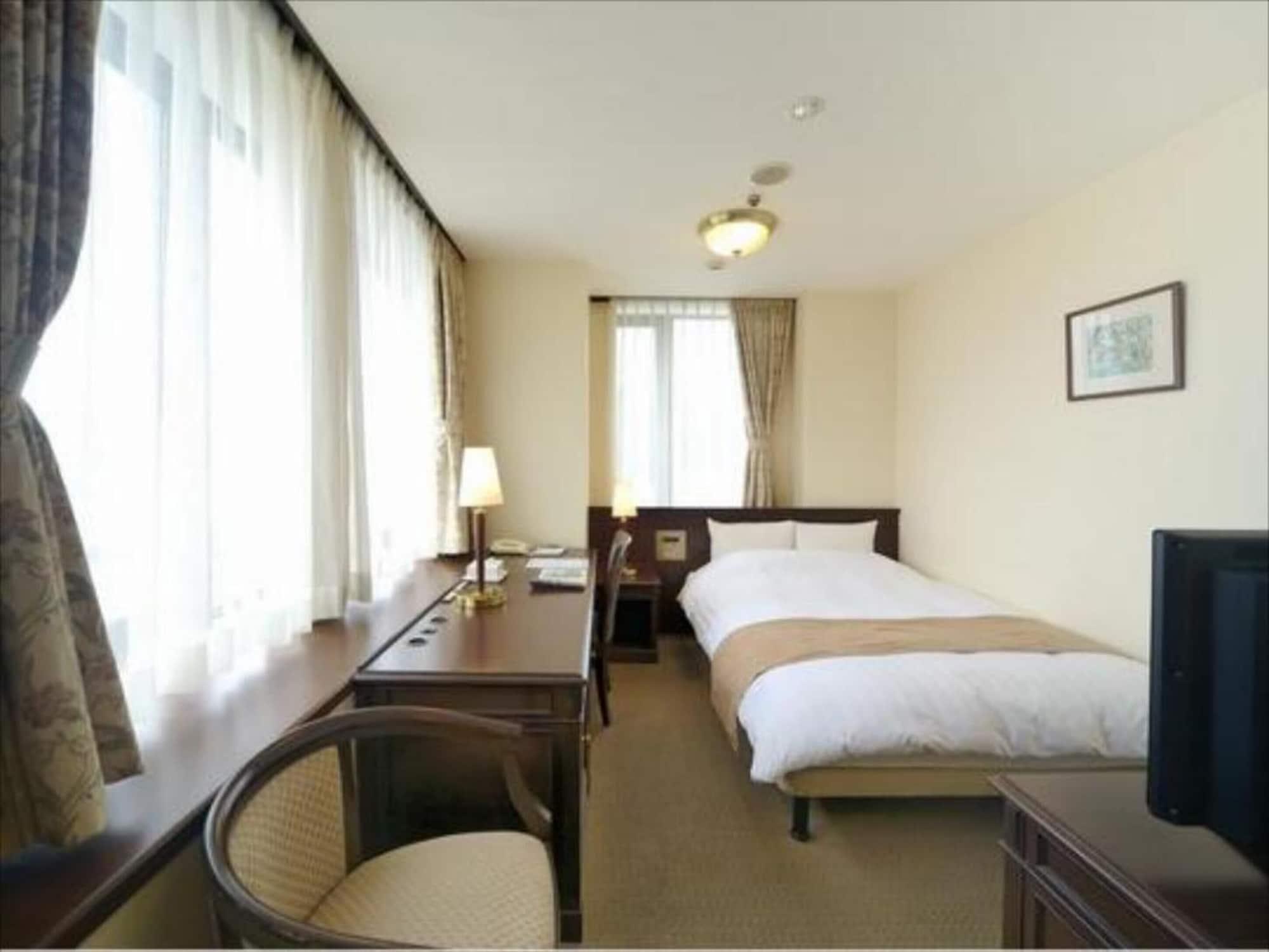 Amami Sunplaza Hotel Екстериор снимка