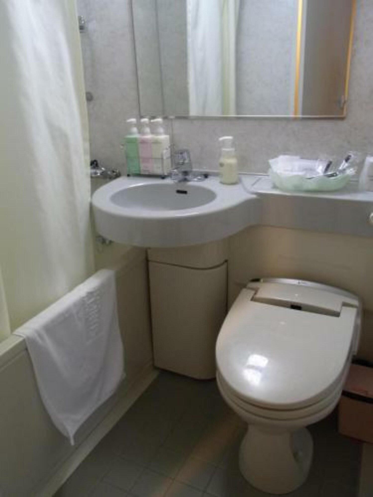 Amami Sunplaza Hotel Екстериор снимка