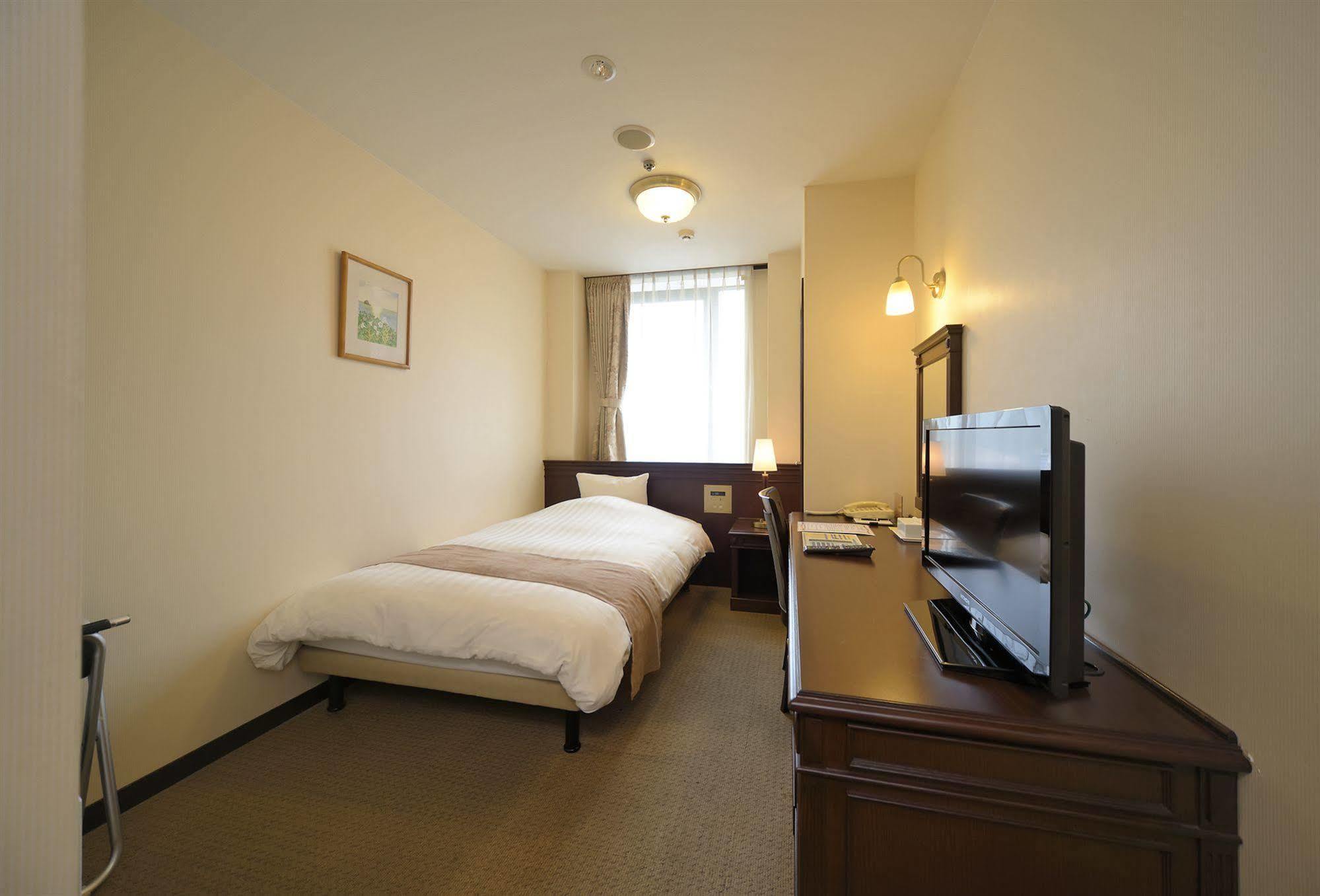 Amami Sunplaza Hotel Екстериор снимка