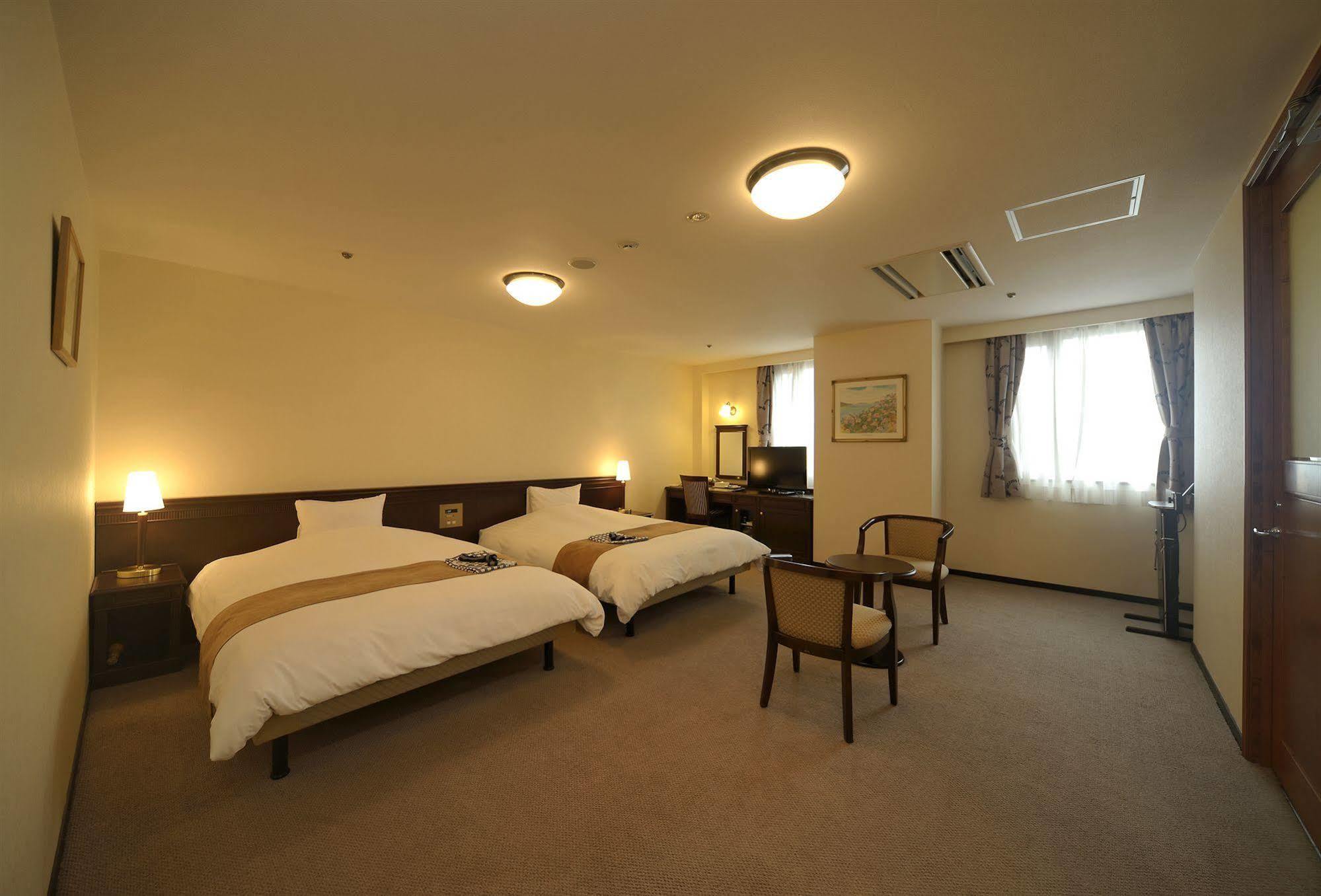 Amami Sunplaza Hotel Екстериор снимка
