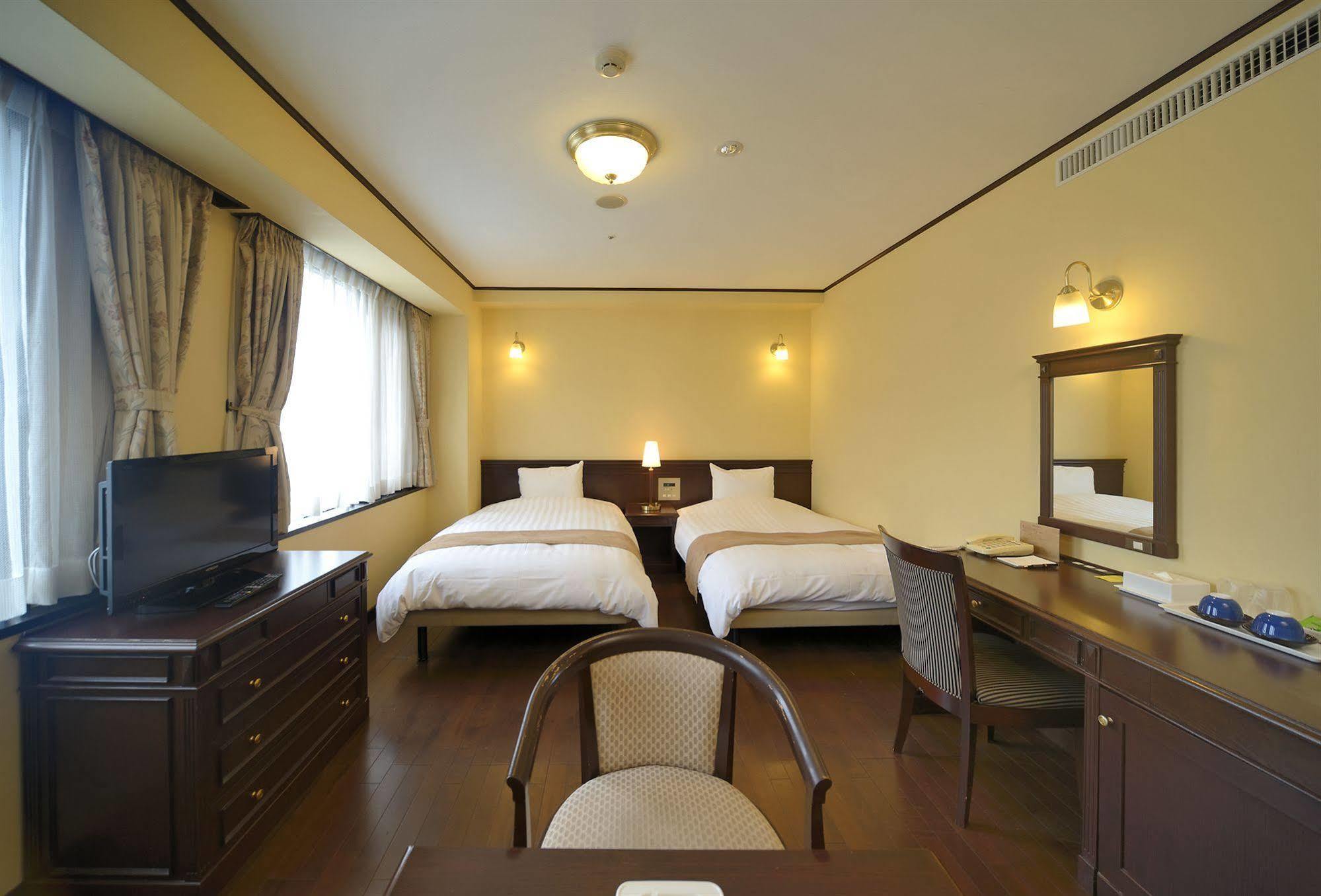 Amami Sunplaza Hotel Екстериор снимка