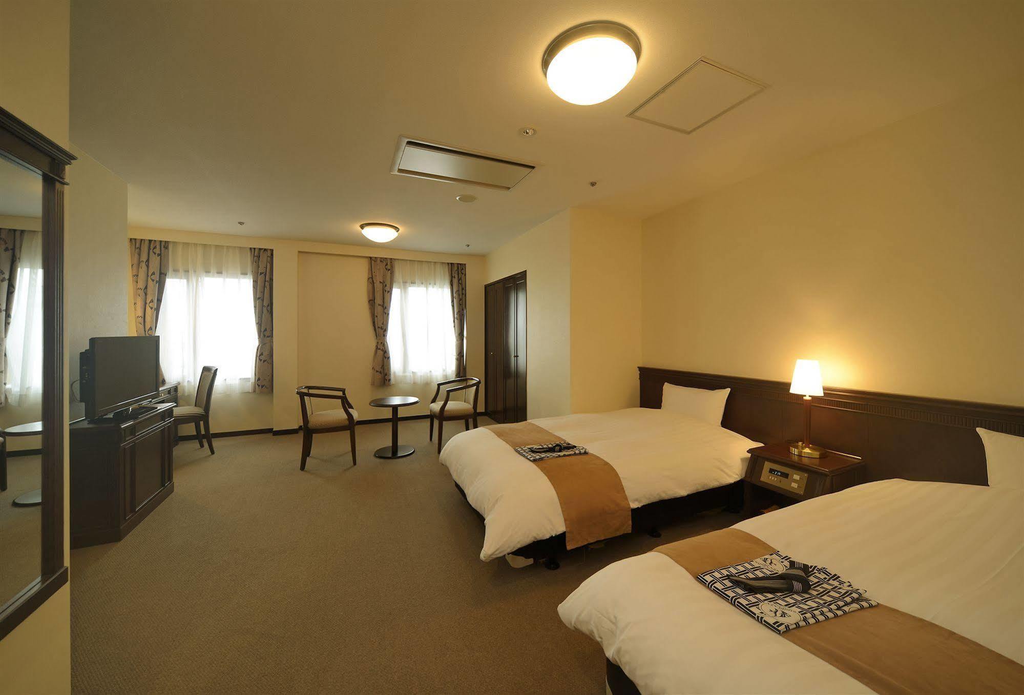 Amami Sunplaza Hotel Екстериор снимка