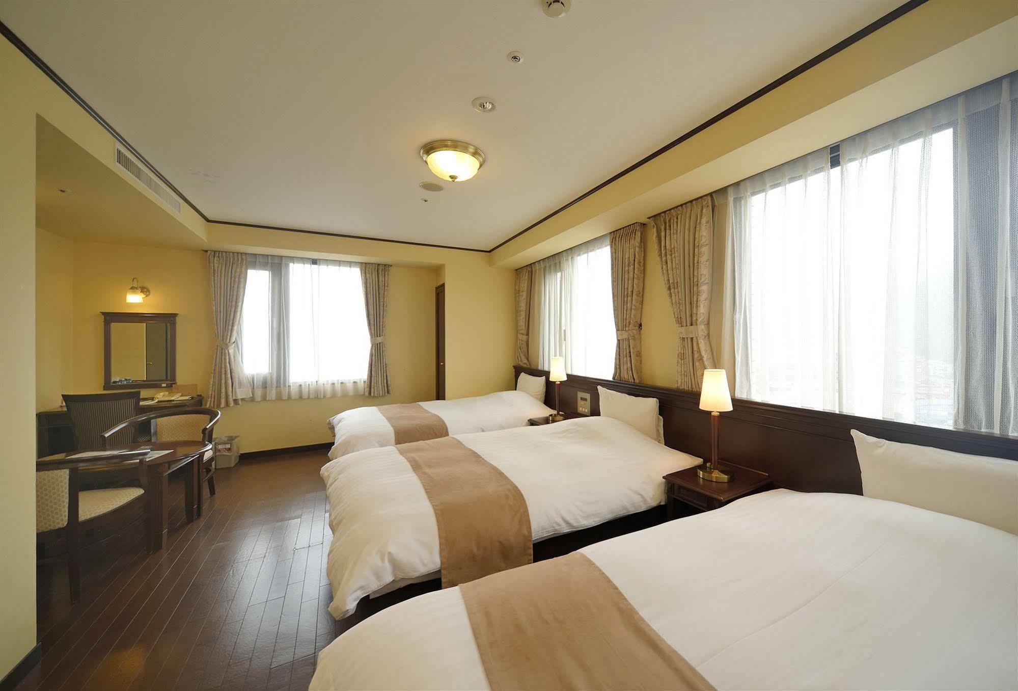 Amami Sunplaza Hotel Екстериор снимка
