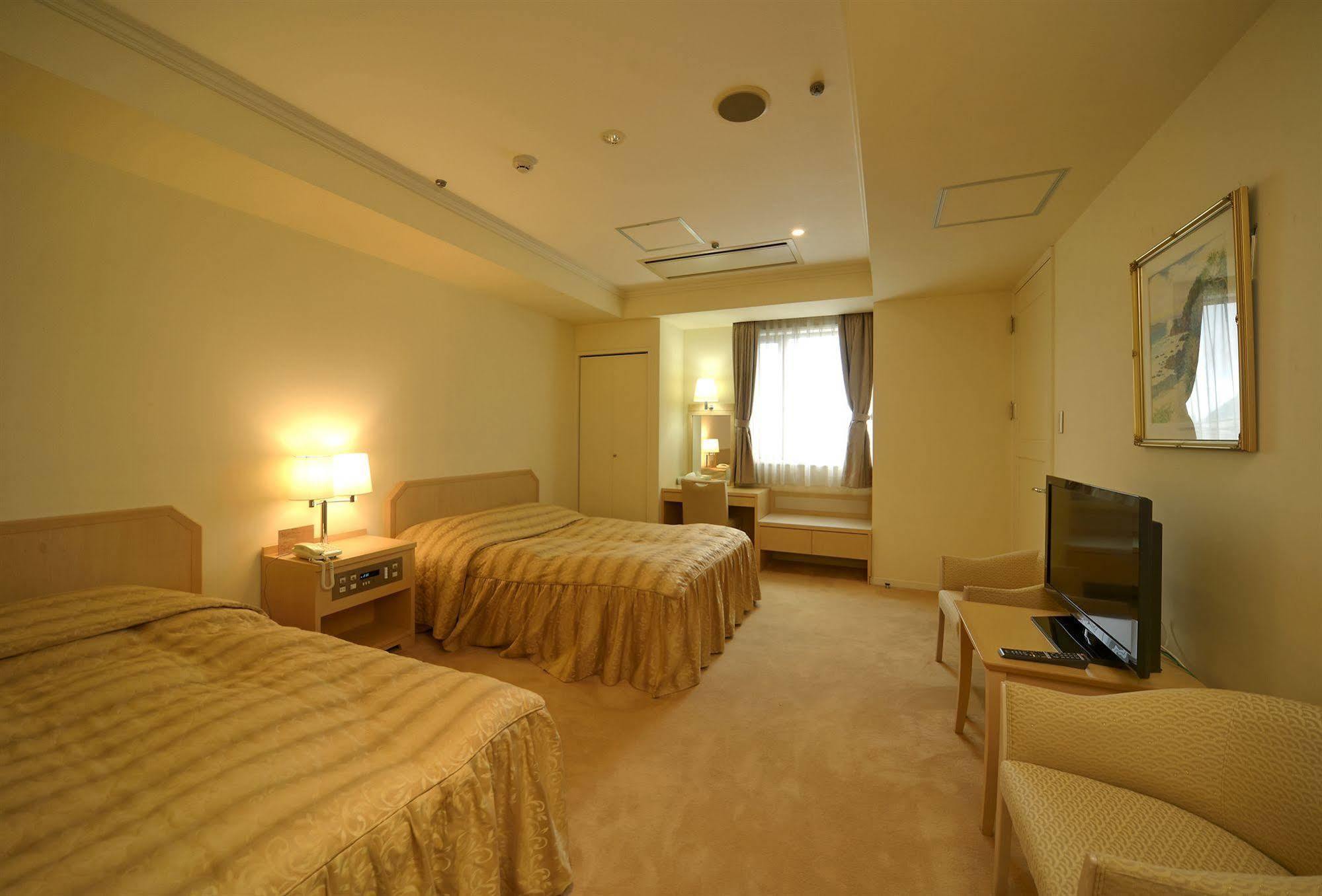 Amami Sunplaza Hotel Екстериор снимка